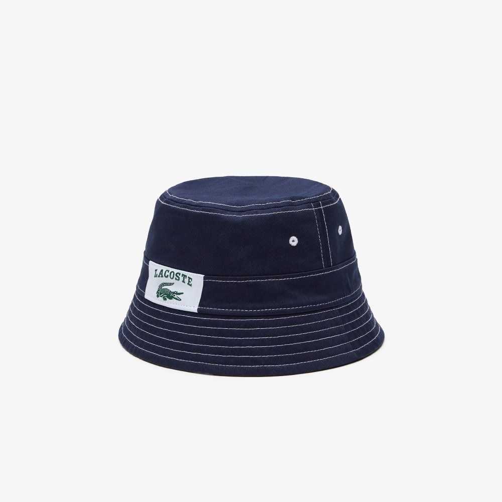 Lacoste Heritage Reversible Print Or Solid Cotton Bucket Hat Navy Blue / White | NTBH-81260