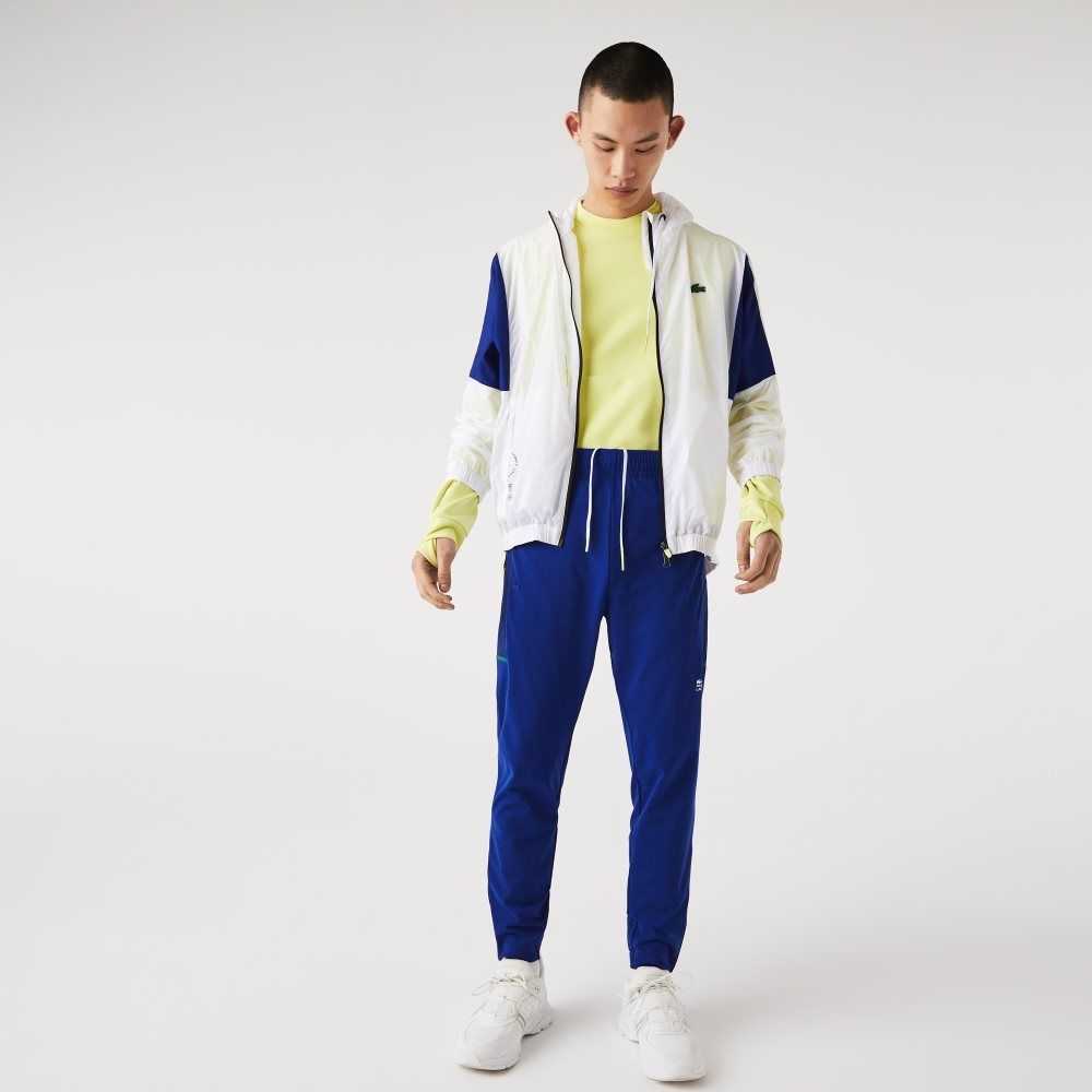 Lacoste SPORT Zip Pockets Tapered Tracksuit Pants Blue / White | XMSR-12387